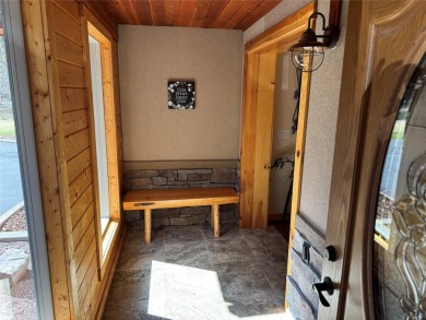 Beautiful open concept single level custom home overlooking the on Double Arrow Lodge in Montana - for sale on GolfHomes.com, golf home, golf lot