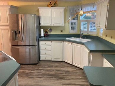 Beautifully Maintained Home in the Gated Community of Pine on Pine Lakes Country Club in Florida - for sale on GolfHomes.com, golf home, golf lot