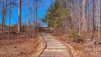 Experience Southern Luxury living set within the golf course on Silver Creek Plantation Country Club in North Carolina - for sale on GolfHomes.com, golf home, golf lot