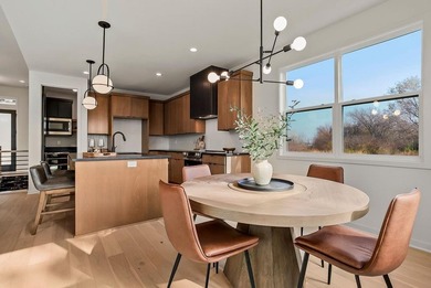 This new reverse 1.5-story Somerset plan by Elevate Design + on Heritage Park Golf Course in Kansas - for sale on GolfHomes.com, golf home, golf lot