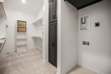 This new reverse 1.5-story Somerset plan by Elevate Design + on Heritage Park Golf Course in Kansas - for sale on GolfHomes.com, golf home, golf lot