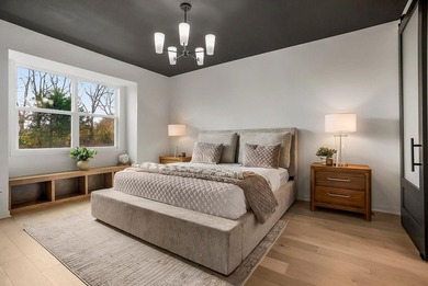 This new reverse 1.5-story Somerset plan by Elevate Design + on Heritage Park Golf Course in Kansas - for sale on GolfHomes.com, golf home, golf lot