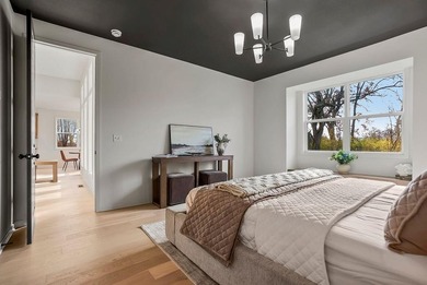 This new reverse 1.5-story Somerset plan by Elevate Design + on Heritage Park Golf Course in Kansas - for sale on GolfHomes.com, golf home, golf lot