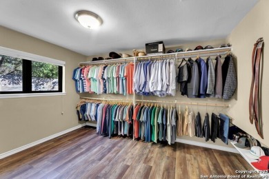 In the charming town of Hollywood Park sits 608 El Portal, a on The Club at Sonterra in Texas - for sale on GolfHomes.com, golf home, golf lot