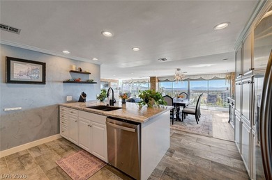 EXPERIENCE ELEVATED LIVING IN THIS HIGHLY FAVORED *H* UNIT AT on Las Vegas Country Club in Nevada - for sale on GolfHomes.com, golf home, golf lot