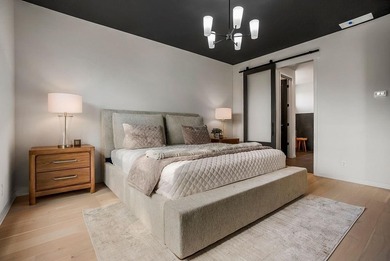 This new reverse 1.5-story Somerset plan by Elevate Design + on Heritage Park Golf Course in Kansas - for sale on GolfHomes.com, golf home, golf lot