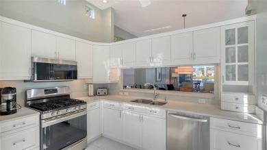 This beautiful 2-bedroom, 2-bathroom villa in the award-winning on University Park Country Club in Florida - for sale on GolfHomes.com, golf home, golf lot