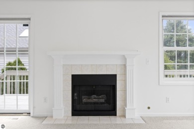 Enjoy the ease of main-floor living in this beautifully on Crown Golf Course in Michigan - for sale on GolfHomes.com, golf home, golf lot
