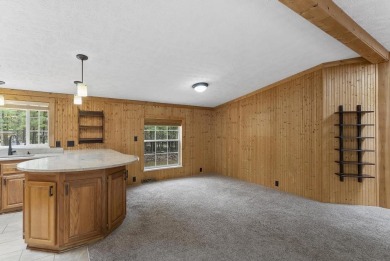 Welcome to this beautifully updated 4-bedroom, 2-bath ranch home on Indian River Golf Club in Michigan - for sale on GolfHomes.com, golf home, golf lot