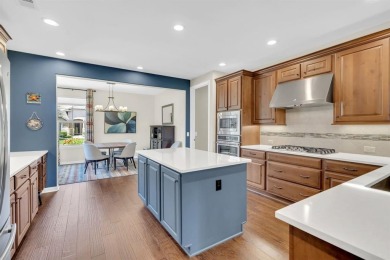 Step into this beautifully appointed two-bedroom, two and a half on Wildhorse Golf Club of Robson Ranch in Texas - for sale on GolfHomes.com, golf home, golf lot
