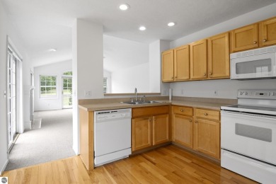 Enjoy the ease of main-floor living in this beautifully on Crown Golf Course in Michigan - for sale on GolfHomes.com, golf home, golf lot