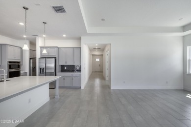 Brand New Build. Experience luxury living in this stunning on LPGA International Golf Course in Florida - for sale on GolfHomes.com, golf home, golf lot