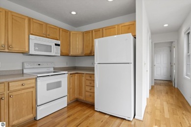 Enjoy the ease of main-floor living in this beautifully on Crown Golf Course in Michigan - for sale on GolfHomes.com, golf home, golf lot
