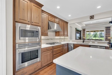 Step into this beautifully appointed two-bedroom, two and a half on Wildhorse Golf Club of Robson Ranch in Texas - for sale on GolfHomes.com, golf home, golf lot