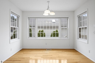 Enjoy the ease of main-floor living in this beautifully on Crown Golf Course in Michigan - for sale on GolfHomes.com, golf home, golf lot