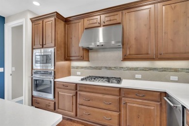 Step into this beautifully appointed two-bedroom, two and a half on Wildhorse Golf Club of Robson Ranch in Texas - for sale on GolfHomes.com, golf home, golf lot