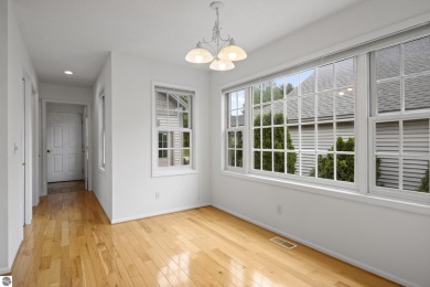 Enjoy the ease of main-floor living in this beautifully on Crown Golf Course in Michigan - for sale on GolfHomes.com, golf home, golf lot