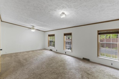Welcome to this beautifully updated 4-bedroom, 2-bath ranch home on Indian River Golf Club in Michigan - for sale on GolfHomes.com, golf home, golf lot