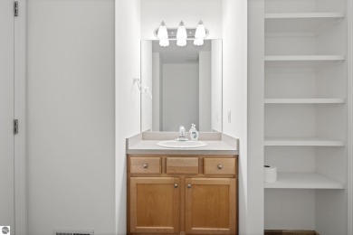 Enjoy the ease of main-floor living in this beautifully on Crown Golf Course in Michigan - for sale on GolfHomes.com, golf home, golf lot