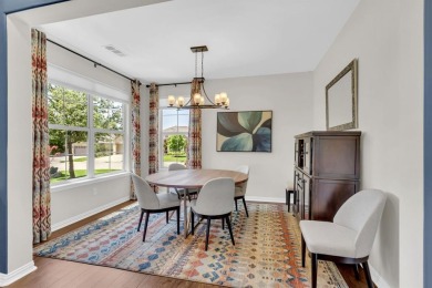 Step into this beautifully appointed two-bedroom, two and a half on Wildhorse Golf Club of Robson Ranch in Texas - for sale on GolfHomes.com, golf home, golf lot