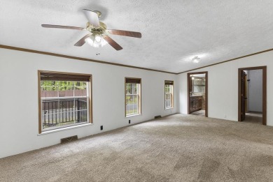 Welcome to this beautifully updated 4-bedroom, 2-bath ranch home on Indian River Golf Club in Michigan - for sale on GolfHomes.com, golf home, golf lot