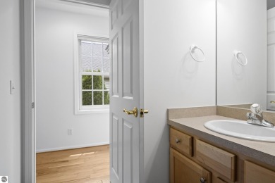 Enjoy the ease of main-floor living in this beautifully on Crown Golf Course in Michigan - for sale on GolfHomes.com, golf home, golf lot