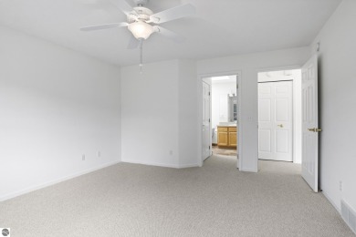Enjoy the ease of main-floor living in this beautifully on Crown Golf Course in Michigan - for sale on GolfHomes.com, golf home, golf lot