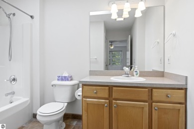 Enjoy the ease of main-floor living in this beautifully on Crown Golf Course in Michigan - for sale on GolfHomes.com, golf home, golf lot