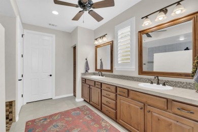 Step into this beautifully appointed two-bedroom, two and a half on Wildhorse Golf Club of Robson Ranch in Texas - for sale on GolfHomes.com, golf home, golf lot