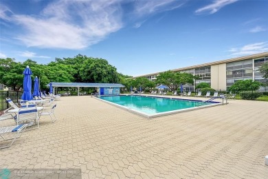 GREAT LOCATION PATIO FACES EAST. ONE OF THE BEST BUILDING IN on Wynmoor Golf Course in Florida - for sale on GolfHomes.com, golf home, golf lot