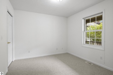 Enjoy the ease of main-floor living in this beautifully on Crown Golf Course in Michigan - for sale on GolfHomes.com, golf home, golf lot