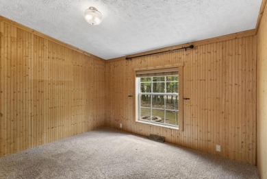 Welcome to this beautifully updated 4-bedroom, 2-bath ranch home on Indian River Golf Club in Michigan - for sale on GolfHomes.com, golf home, golf lot