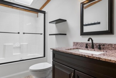 Welcome to this beautifully updated 4-bedroom, 2-bath ranch home on Indian River Golf Club in Michigan - for sale on GolfHomes.com, golf home, golf lot