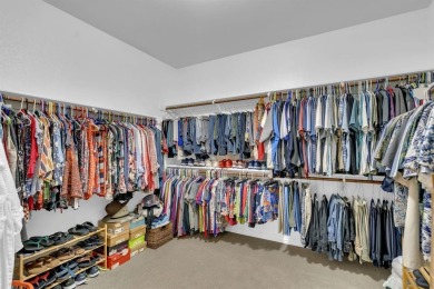 Step into this beautifully appointed two-bedroom, two and a half on Wildhorse Golf Club of Robson Ranch in Texas - for sale on GolfHomes.com, golf home, golf lot