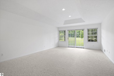 Enjoy the ease of main-floor living in this beautifully on Crown Golf Course in Michigan - for sale on GolfHomes.com, golf home, golf lot