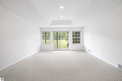 Enjoy the ease of main-floor living in this beautifully on Crown Golf Course in Michigan - for sale on GolfHomes.com, golf home, golf lot