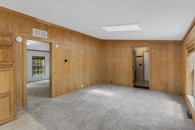 Welcome to this beautifully updated 4-bedroom, 2-bath ranch home on Indian River Golf Club in Michigan - for sale on GolfHomes.com, golf home, golf lot