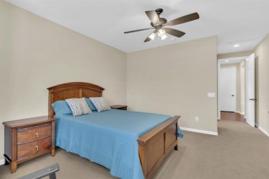 Step into this beautifully appointed two-bedroom, two and a half on Wildhorse Golf Club of Robson Ranch in Texas - for sale on GolfHomes.com, golf home, golf lot