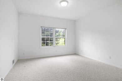 Enjoy the ease of main-floor living in this beautifully on Crown Golf Course in Michigan - for sale on GolfHomes.com, golf home, golf lot