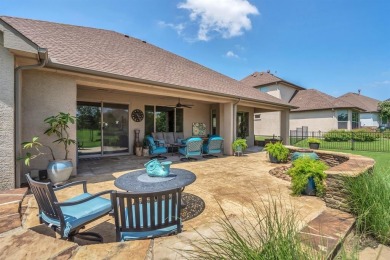 Step into this beautifully appointed two-bedroom, two and a half on Wildhorse Golf Club of Robson Ranch in Texas - for sale on GolfHomes.com, golf home, golf lot