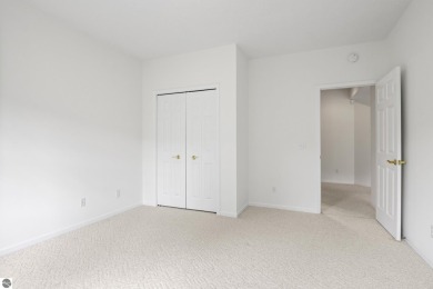 Enjoy the ease of main-floor living in this beautifully on Crown Golf Course in Michigan - for sale on GolfHomes.com, golf home, golf lot