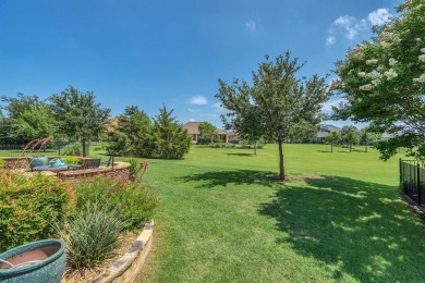 Step into this beautifully appointed two-bedroom, two and a half on Wildhorse Golf Club of Robson Ranch in Texas - for sale on GolfHomes.com, golf home, golf lot