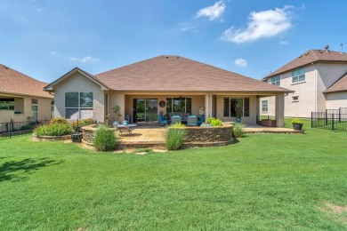 Step into this beautifully appointed two-bedroom, two and a half on Wildhorse Golf Club of Robson Ranch in Texas - for sale on GolfHomes.com, golf home, golf lot