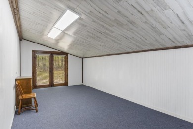 Welcome to this beautifully updated 4-bedroom, 2-bath ranch home on Indian River Golf Club in Michigan - for sale on GolfHomes.com, golf home, golf lot