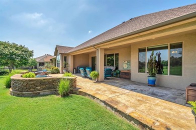 Step into this beautifully appointed two-bedroom, two and a half on Wildhorse Golf Club of Robson Ranch in Texas - for sale on GolfHomes.com, golf home, golf lot