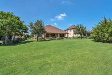 Step into this beautifully appointed two-bedroom, two and a half on Wildhorse Golf Club of Robson Ranch in Texas - for sale on GolfHomes.com, golf home, golf lot
