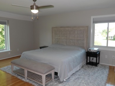 6 months of HOA fees on seller. Stunning Colonial overlooking on Travis Pointe Country Club in Michigan - for sale on GolfHomes.com, golf home, golf lot