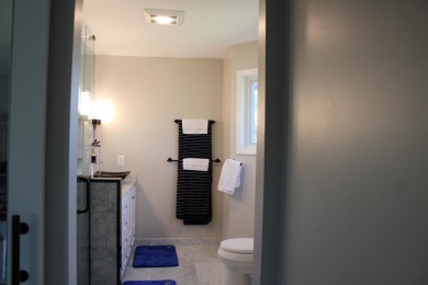 6 months of HOA fees on seller. Stunning Colonial overlooking on Travis Pointe Country Club in Michigan - for sale on GolfHomes.com, golf home, golf lot