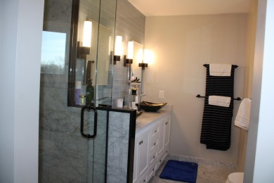 6 months of HOA fees on seller. Stunning Colonial overlooking on Travis Pointe Country Club in Michigan - for sale on GolfHomes.com, golf home, golf lot