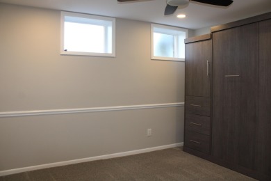 6 months of HOA fees on seller. Stunning Colonial overlooking on Travis Pointe Country Club in Michigan - for sale on GolfHomes.com, golf home, golf lot